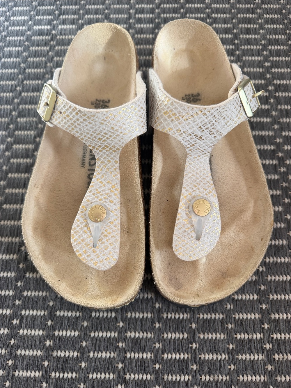 Birkenstock White Sandal with Gold Accents T-Strap